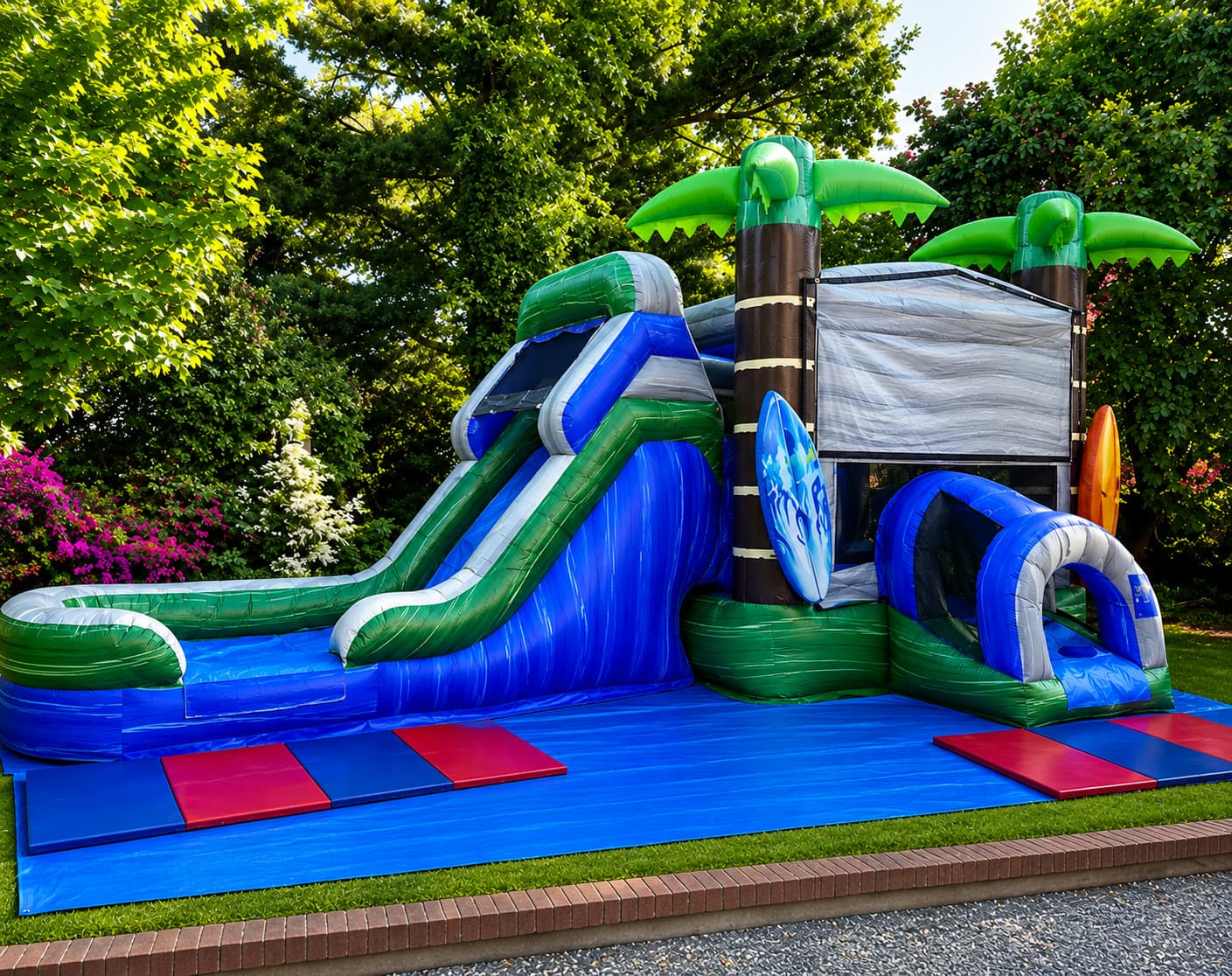 Tropical palm-tree themed slide rental from Bounce LI